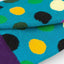 Colorful polka dot fabric with blue background