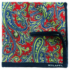 Paisley patterned blanket with red, blue, and green colors on a white background