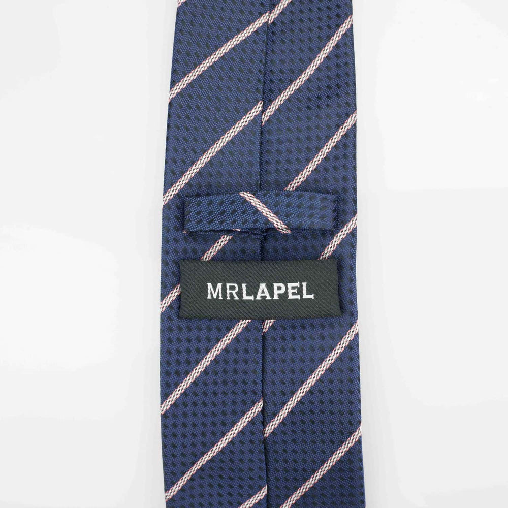 reverse of a navy silk tie with pink diagonal stripes on it