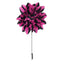 Floral lapel pin with pink and black petals on a white background