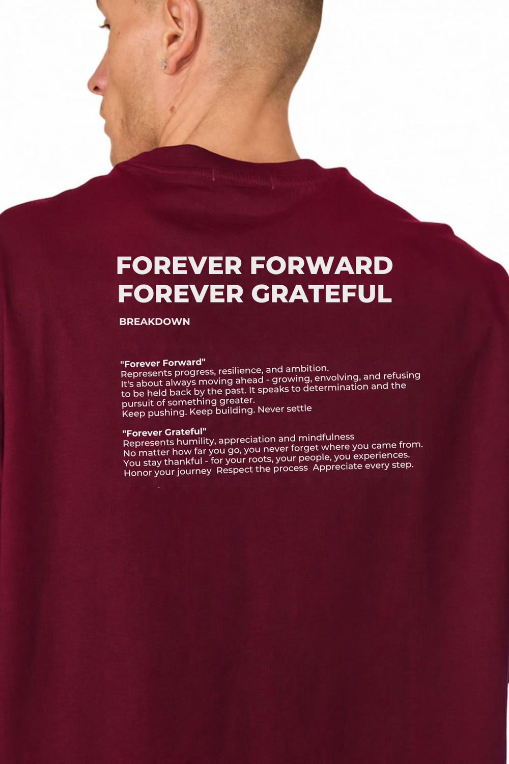 A man shown from the back wearing a maroon crewneck sweatshirt with white printed text on the back reading 'FOREVER FORWARD FOREVER GRATEFUL' and 'BREAKDOWN' followed by smaller motivational text.