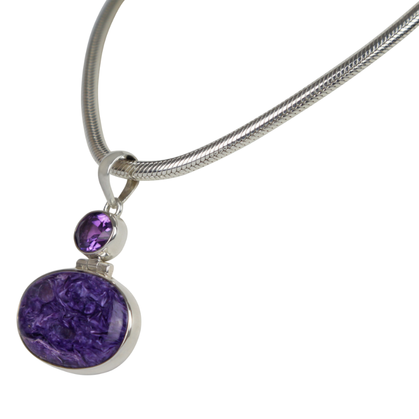 Very beautiful purple colour Oval cut Chorite pendant sitting horizontally with a very beautiful faceted Amethyst Secondary image