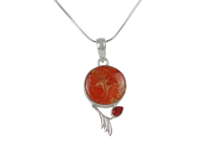 This beautiful orange colour round Sponge Coral pendant is set in an open back bazel.
