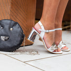 Silver mirrored block heel sandal by Mimi | Comes with gentle feather-front and intricate ankle strap