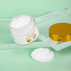Ammuri Bioactive Snail Repair Cream in a jar, showcasing its creamy texture, ideal for anti-aging snail cream users
