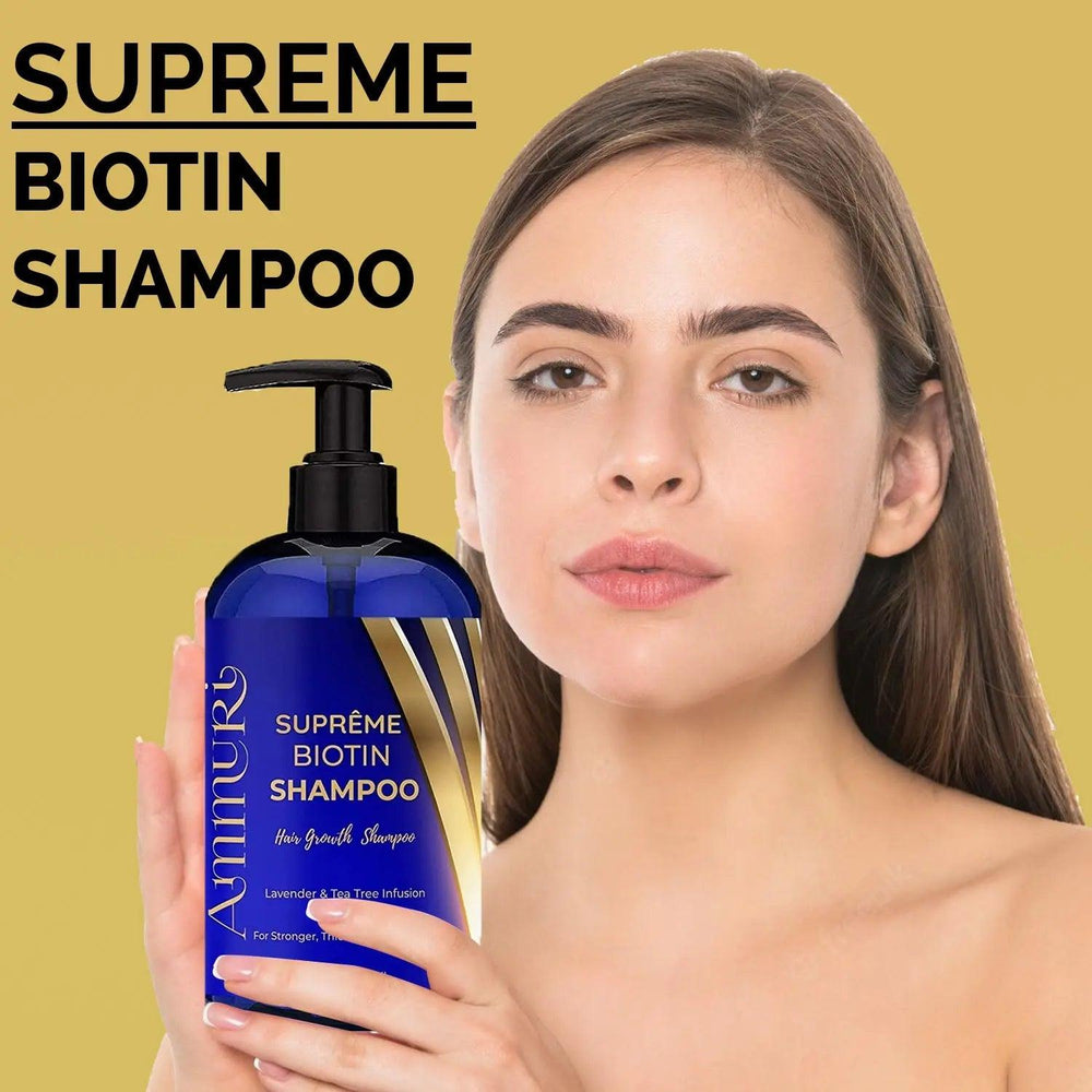 Ammuri Skincare supreme biotin shampoo for thicker hair held by woman with long brown hair