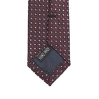 Burgundy tie with handmade tag showing