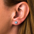 Chic Eye Stud Earrings with Turquoise Zircon by Del Corso - Crafted in 925 Sterling Silver, ultra - lightweight at 0.7 g, elegant unisex design for everyday wear, hypoallergenic and durable, offering style, comfort, and symbolic protection - Stud Earrings - British D'sire