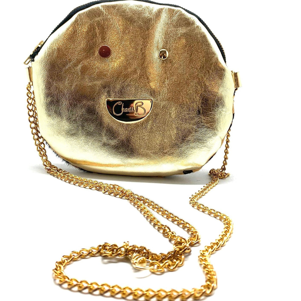 Muse wonky eye chain gold-animal cow handbag - British D'sire