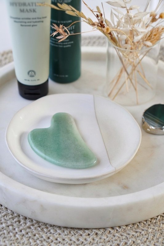 Jade Crystal Gua Sha with Black Skull Pouch - Cosmetic Tools - British D'sire Main image