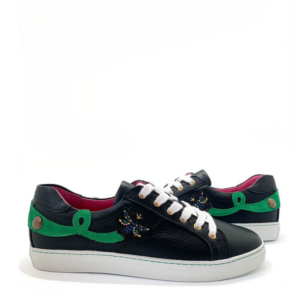 A pair of bespoke footwear called Miel Black B-Line Sneaker