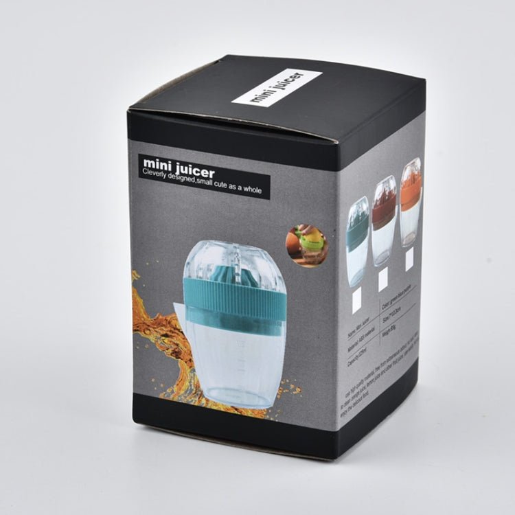 Multi - function Manual Mini Lemon Juicer with a Graduation Cup Juicer (Random Color Delivery) - British D'sire