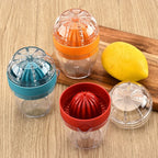 Multi - function Manual Mini Lemon Juicer with a Graduation Cup Juicer (Random Color Delivery) - British D'sire