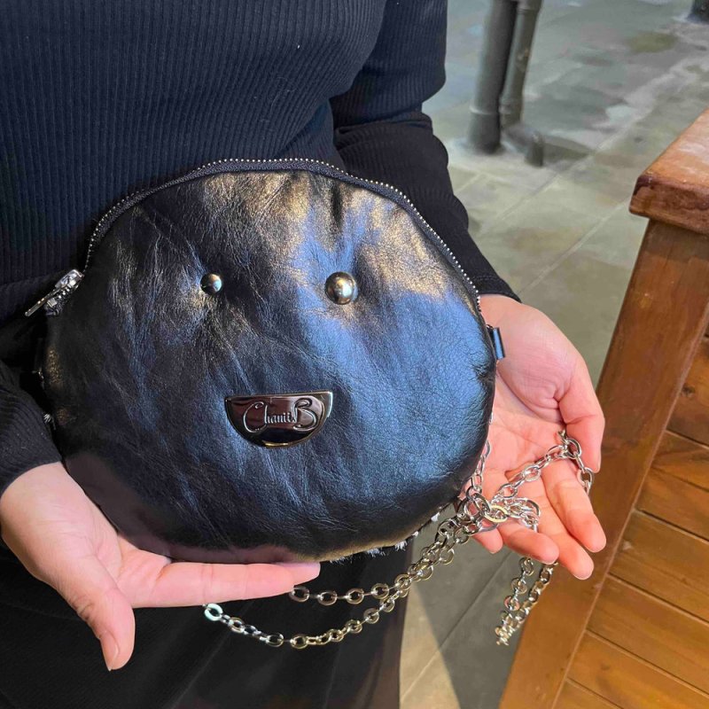 Muse wonky eye chain black - white cow handbag - Handbag - British D'sire