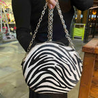Muse wonky eye chain black - white cow handbag - Handbag - British D'sire
