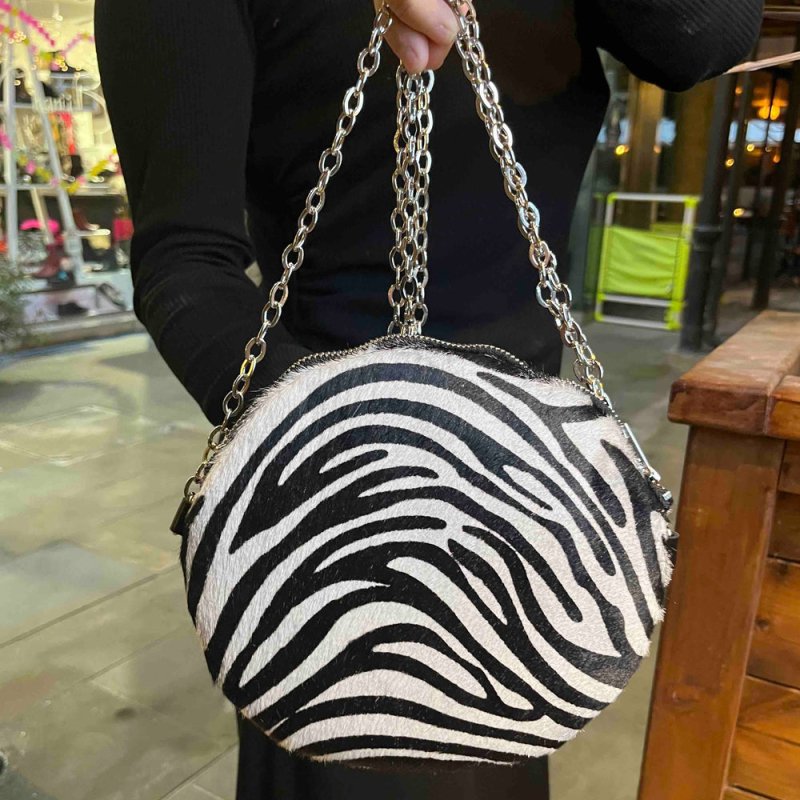 Muse wonky eye chain black - white cow handbag - Handbag - British D'sire