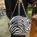 Muse wonky eye chain black-white cow handbag - Chanii B