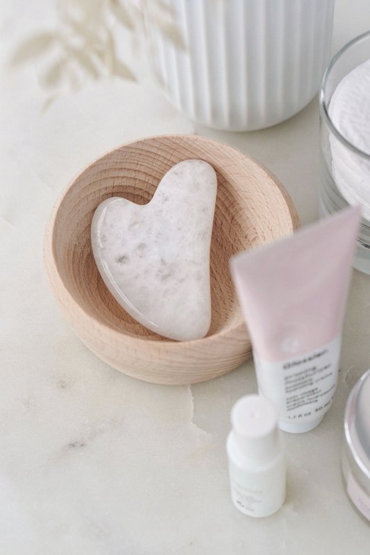 Quartz Crystal Gua Sha with Black Skull Pouch - Cosmetic Tools - British D'sire Main image