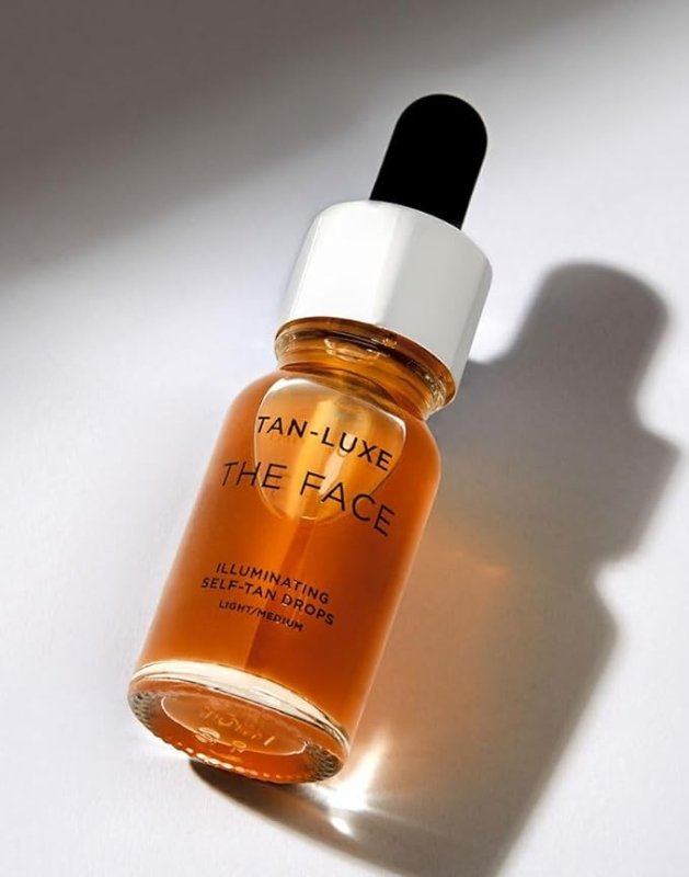 Tan-Luxe THE FACE Light/Medium 10ml Bauble, Illuminating Self-Tan Drops to Transform your Moisturiser into a Custom Tan, Cruelty Free & Vegan - British D'sire Main image