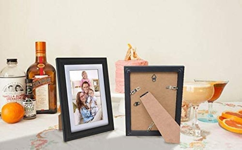 https://www.britishdsire.com/cdn/shop/products/4x6-photo-frames-set-of-8-display-4x6-pictures-with-mat-or-5x7-without-mat-for-wall-decor-or-tabletop-display-blackhousings-frames-705282.jpg?v=1669990244