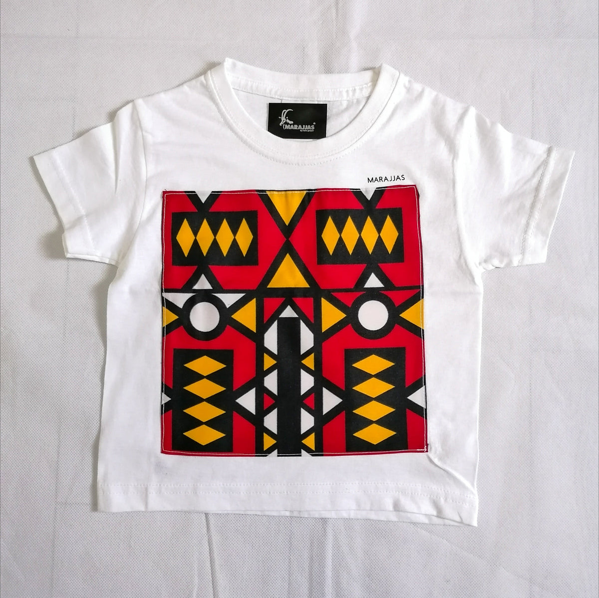 Kids T-shirt in White with red Samakaka print - British D'sire