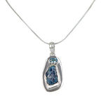 A beautiful rough Neon Apatite pendant accent with a Blue Topaz and elegantly hand set in Sterling Silver bazel. - Necklaces & Pendants - British D'sire