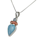 A Charming Inverted Teardrop Shaped Larima Pendat Accent with a Natural Coral Branch and a Beautiful Faceted Bluetapz - Necklaces & Pendants - British D'sire