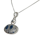 A charming Oval Shaped K2 Jasper Pendant Accent with a Tiny Blue Topaz on a Wagon Wheel - Necklaces & Pendants - British D'sire