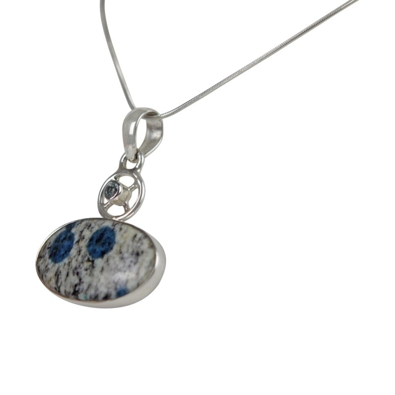 A charming Oval Shaped K2 Jasper Pendant Accent with a Tiny Blue Topaz on a Wagon Wheel - Necklaces & Pendants - British D'sire