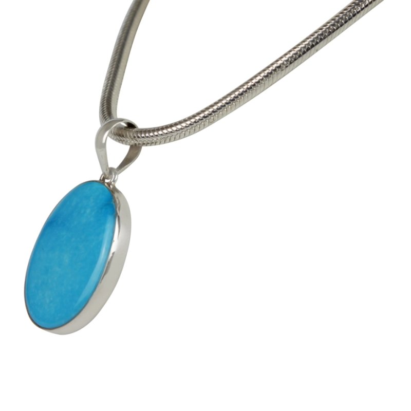 A classic Circle to Oval Shaped Persian Blue Turquoise Set on Sterling Silver Open Back bazel Secondary image