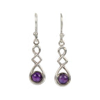 A swirly, unique and elegant pair of sterling silver earrings, carrying a range of gems - Earrings - British D'sire