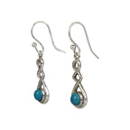 A swirly, unique and elegant pair of sterling silver earrings, carrying a range of gems - Earrings - British D'sire