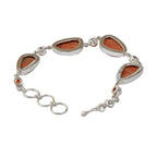 An Elegant Design with 4 Beautiful Sponge Corals set in a Sterling Silver Bracelet and Accented with Small Round Carnalian Gems - Bracelets & Bangles - British D'sire