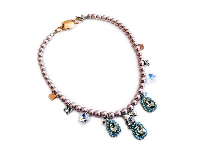 Beaded necklace with light blue rhinestones, silver plated brass and small charms. - Necklaces - British D'sire