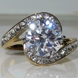 Jewellery Kingdom Ladies Solitaire Accents Swirl 7K Steel Ring (Gold) Secondary image