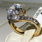 Jewellery Kingdom Ladies Solitaire Accents Swirl 7K Steel Ring (Gold) - Rings - British D'sire